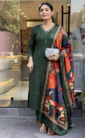 Women wearing dark green embroidered kurta pant set with printed dupatta